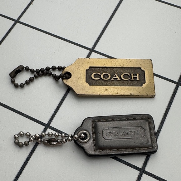 Coach Accessories - Coach Brass and Charcoal Keychains